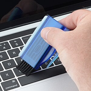 Additional Image 3 - a hand holding a blue flash drive on a keyboard
