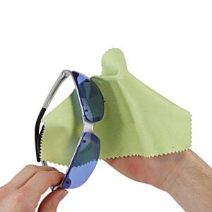 Additional Image 1 - a hand holding sunglasses