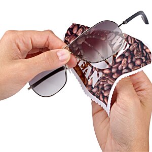 Additional Image 1 - a person holding sunglasses
