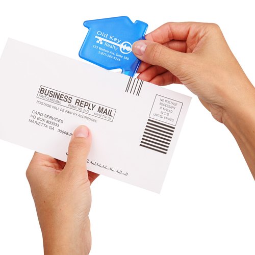 Additional Image 1 - a person holding a white envelope