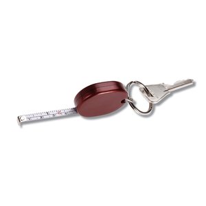 Additional Image 1 - a key chain with a red oval
