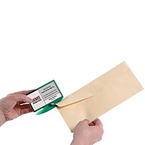 Additional Image 2 - a person handing a piece of paper to another person