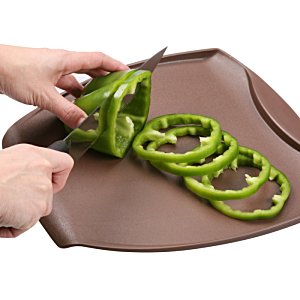 Additional Image 1 - a person cutting green pepper