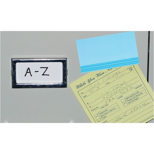 Additional Image 2 - a paper with a blue sticker on the wall