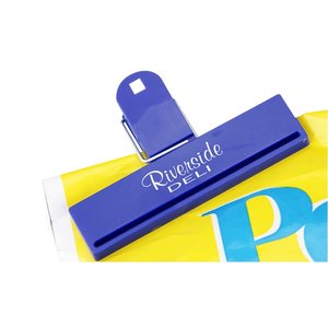 Additional Image 1 - a blue clip on a yellow paper