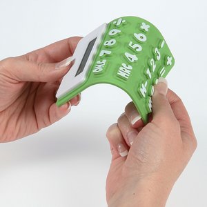 Additional Image 2 - a person holding a green and white label