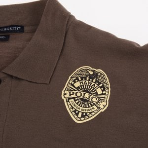 Additional Image 2 - a brown shirt with a pin on it
