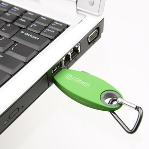 Additional Image 2 - a green usb drive attached to a laptop