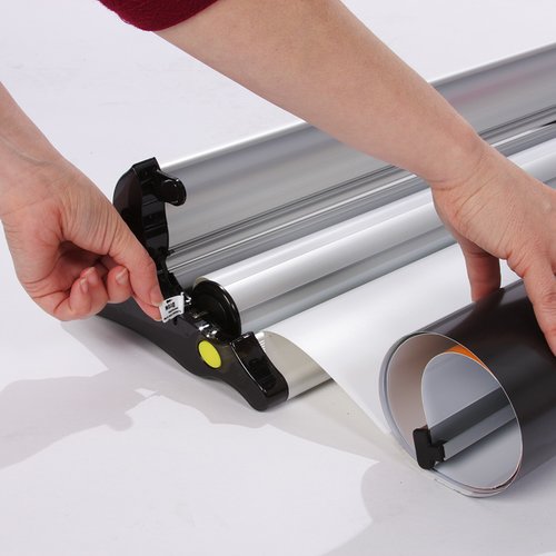 Additional Image 2 - a person holding a roll of paper