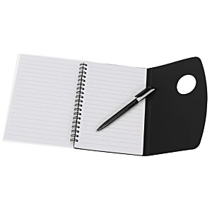 Additional Image 1 - a black pen on a white and black cutting board
