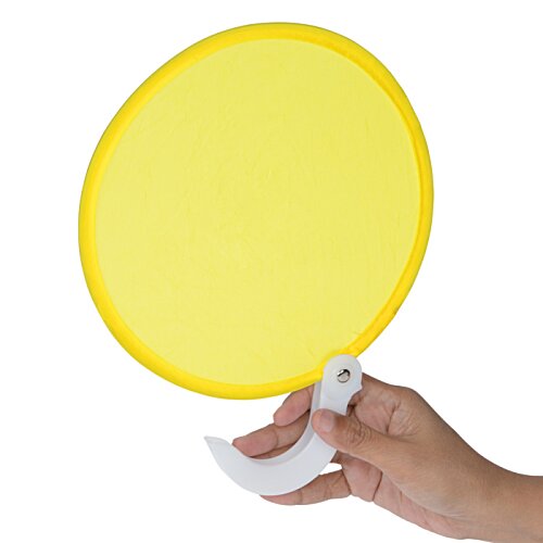 Additional Image 2 - a hand holding a yellow circle