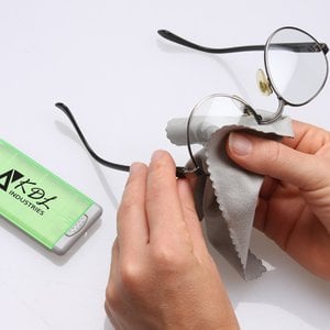 Additional Image 1 - a person holding a small white object