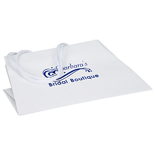 Additional Image 2 - a white paper with blue text