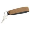 a brown key chain with a white key ring