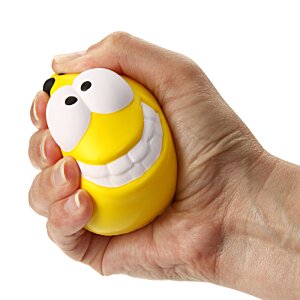 Additional Image 1 - a hand holding a yellow toy
