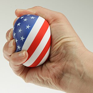 Additional Image 1 - a hand holding a ball with a flag on it