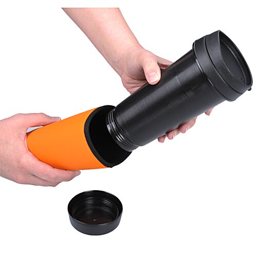 Additional Image 2 - a hand holding a black and orange tube