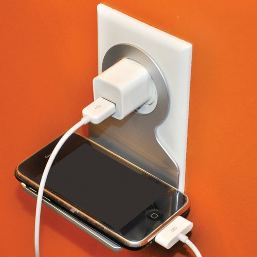 Additional Image 3 - a cell phone charging in a wall outlet
