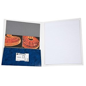 Additional Image 2 - a white paper with orange and blue designs