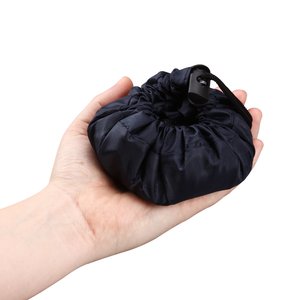 Additional Image 3 - a hand holding a black object