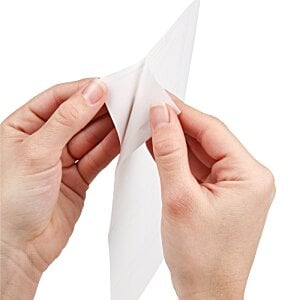 Additional Image 2 - a person folding a paper