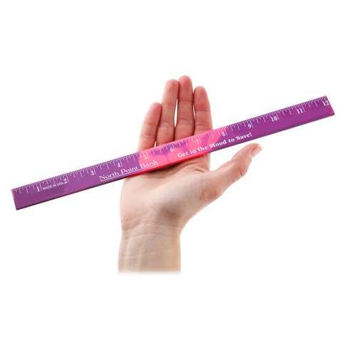 Additional Image 1 - a hand holding a ruler