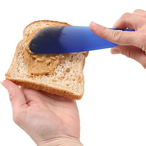 Additional Image 2 - a person spreading a piece of bread