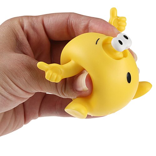 Additional Image 1 - a hand holding a yellow toy
