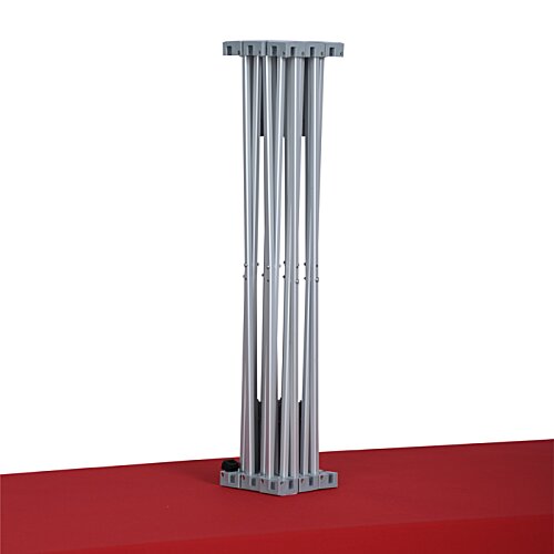 Additional Image 1 - a tall silver pillar on a red surface