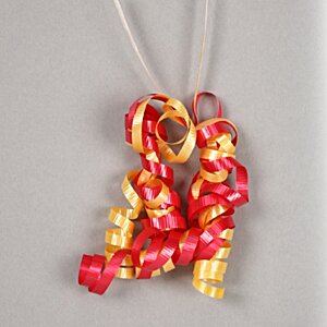 Additional Image 1 - a red and yellow ribbon on a string