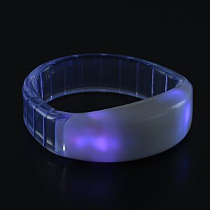 Additional Image 7 - a clear plastic ring with purple light