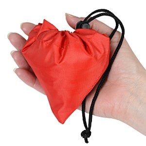 Additional Image 2 - a hand holding a black heart shaped device