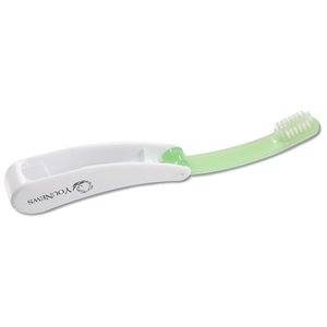 Additional Image 1 - a white toothbrush with green handle