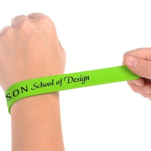 Additional Image 1 - a person's hand holding a green wristband