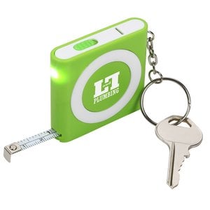 Additional Image 1 - a key chain with a green square with a white circle on it