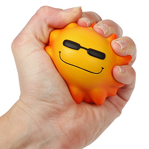 Additional Image 1 - a hand holding a yellow ball with a face drawn on it