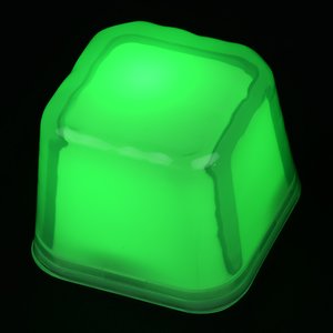Additional Image 6 - a glowing green cube on a black background