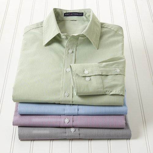 Additional Image 2 - a stack of folded shirts