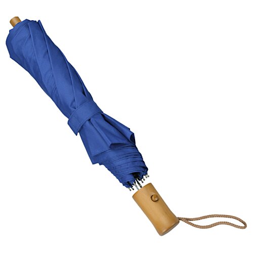 Additional Image 2 - a blue umbrella with a wooden handle