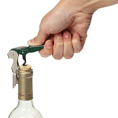 Additional Image 3 - a hand holding a bottle with a corkscrew