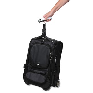 Additional Image 1 - a hand holding a black suitcase