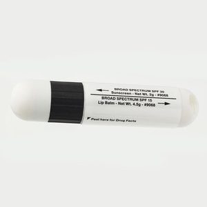 Additional Image 1 - a small white tube with black cap