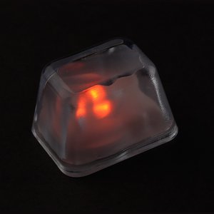 Additional Image 1 - a plastic pyramid with a light inside