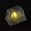 a glowing light in a plastic box