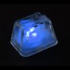 a blue glowing cube on a black background