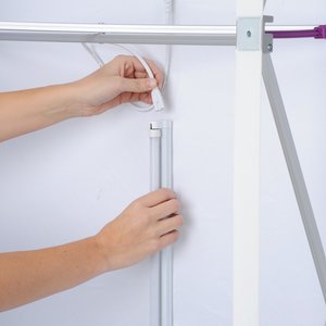 Additional Image 6 - a person holding a white pole