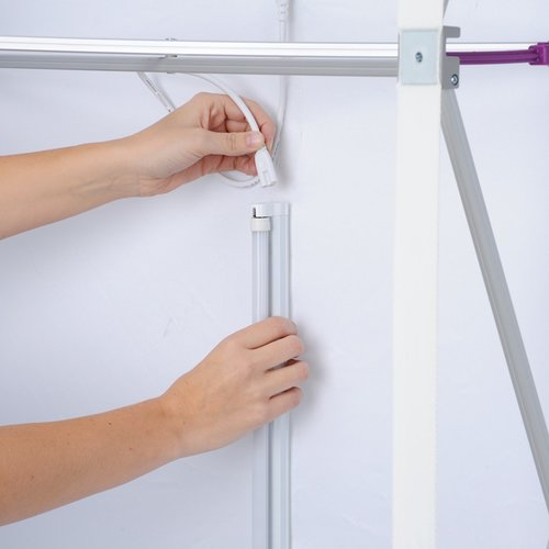 Additional Image 6 - a person holding a white pole