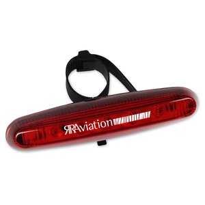 Additional Image 1 - a red bicycle light with a black ring