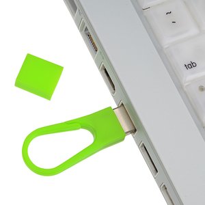 Additional Image 1 - a green usb sticker on a laptop