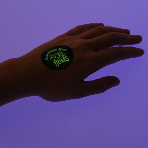 Additional Image 2 - a hand with a green device on it